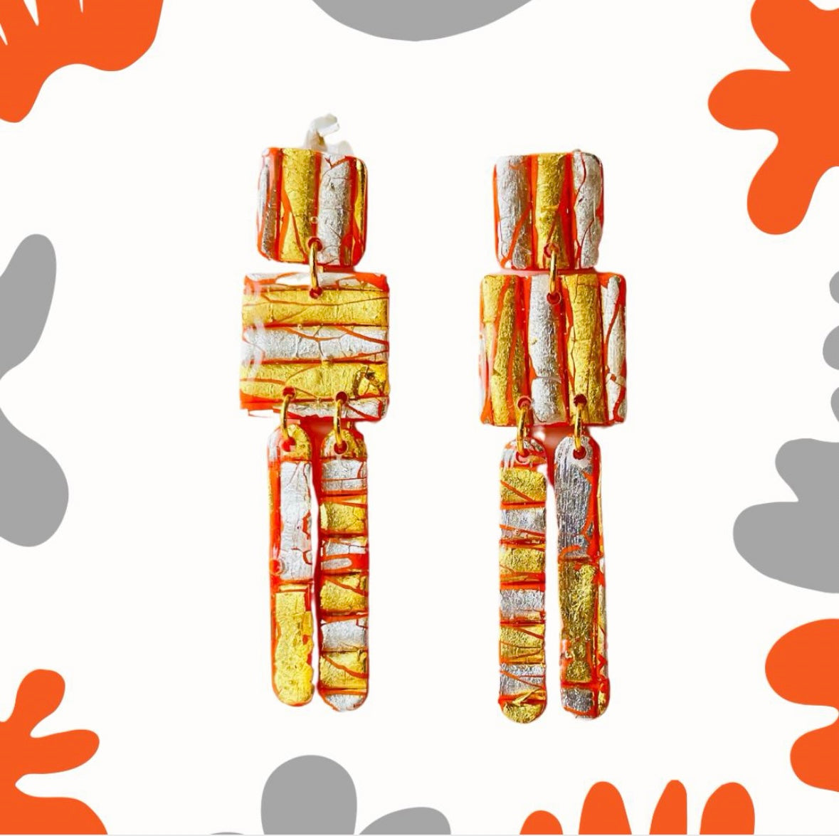 These striking earrings are a true statement piece to express summer fun. Featuring a mix of orange, gold, and silver, they add an opulent touch to elevate any outfit. Wear them under the sun and enjoys the shimmering sparkles created with each move.

These earrings are totally handmade by me and each piece is slightly different.
MySaraJewellery

