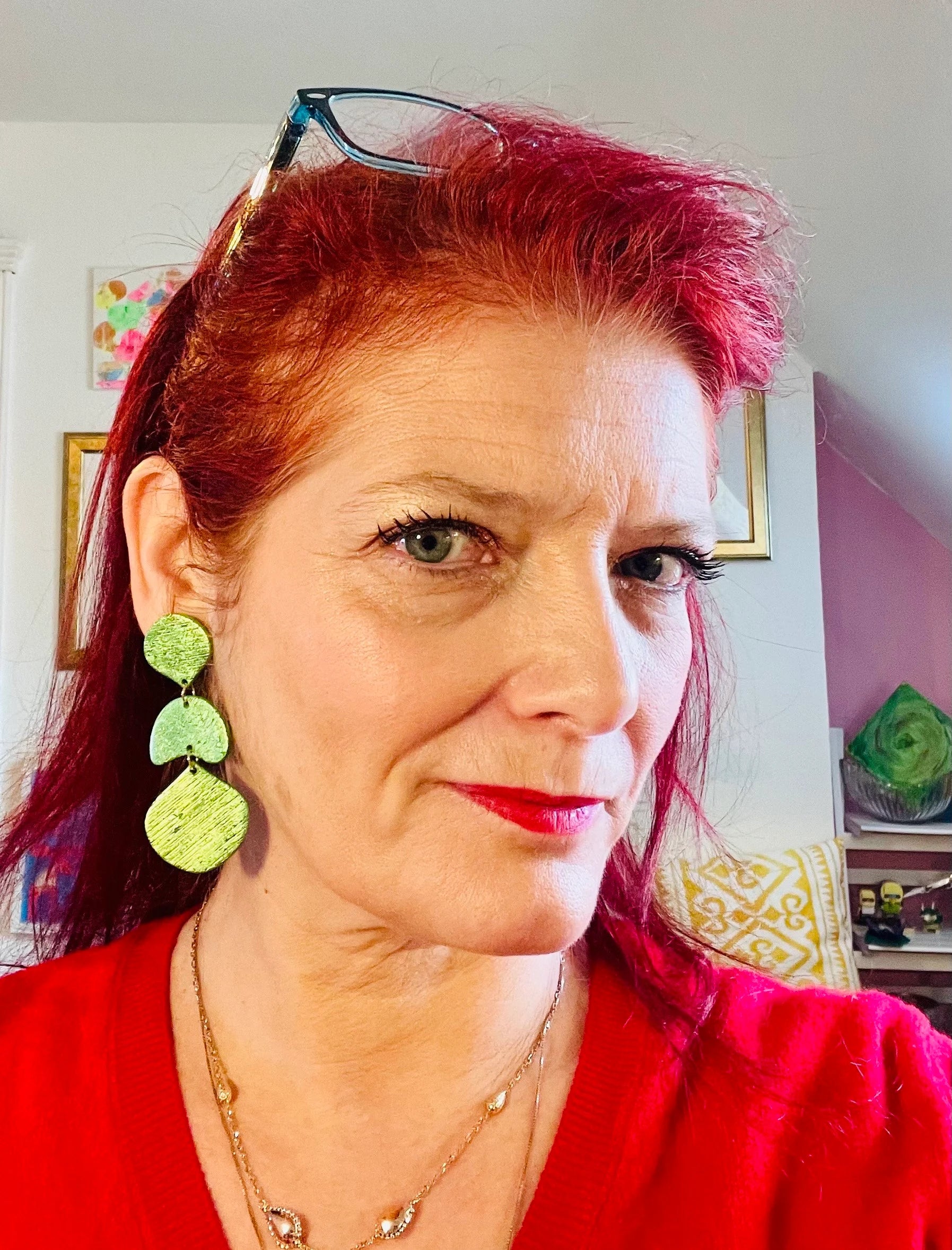 Make the most of the holiday season with these stunning statement earrings. Featuring a vibrant green color and unique texture, they're sure to turn heads at any party. And with their bold design, these earrings make the perfect gift for any fashion-forward friend or loved one. It is always the season for showing off your style! Add a vibrant green accent to your summer dresses on the beach or for an al fresco aperitif!