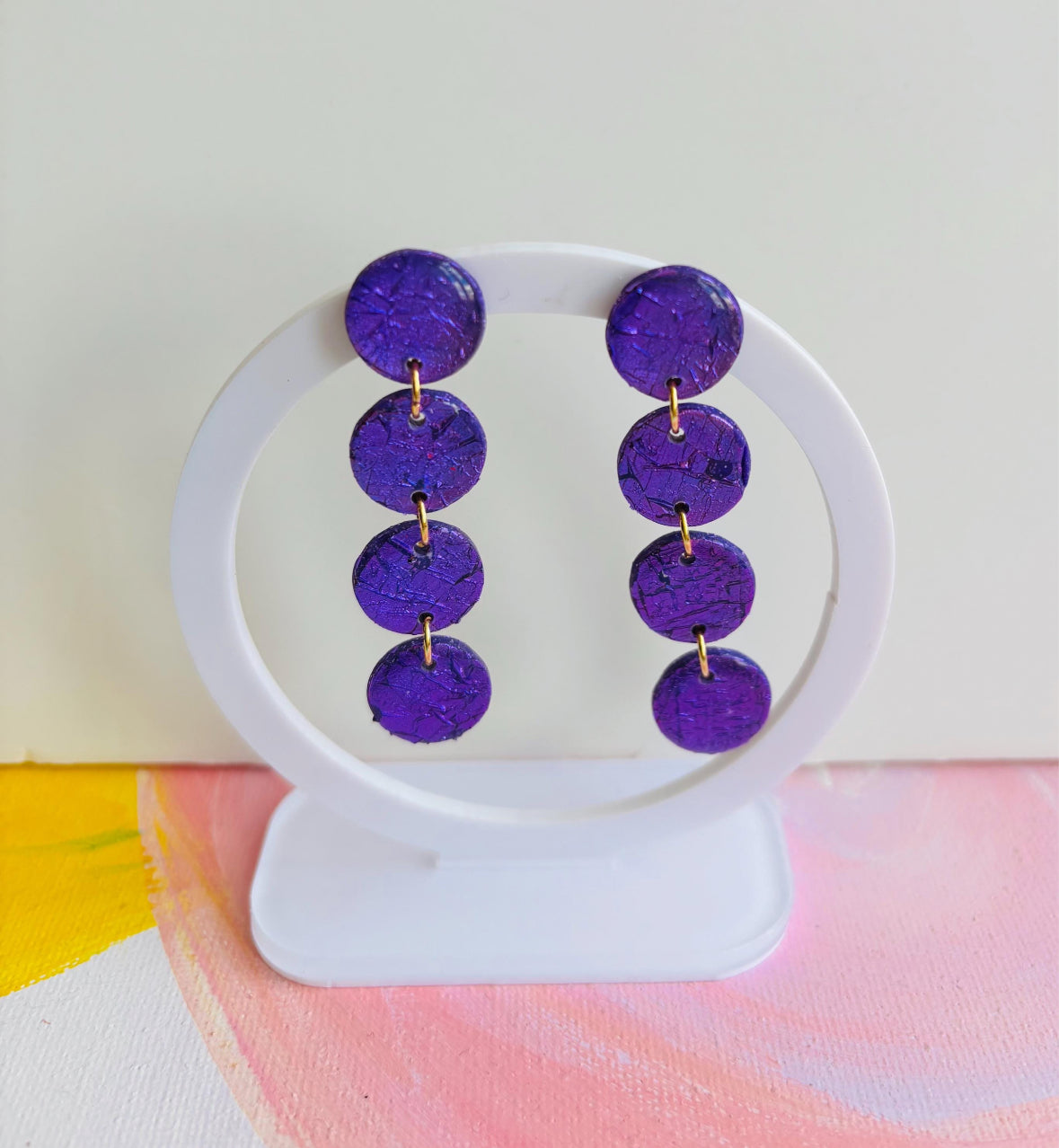 These Purple dangle earrings remind me of blueberries and they will certainly add a pop of color to your everyday outfits. These earrings are colorful but the simple design makes them easy to match whether you choose a minimal look or a summery floral dress.

Make a statement or choose a great handmade gift.

mysarajewellery purple Bolle earrings, handmade polymer clay puple earrings