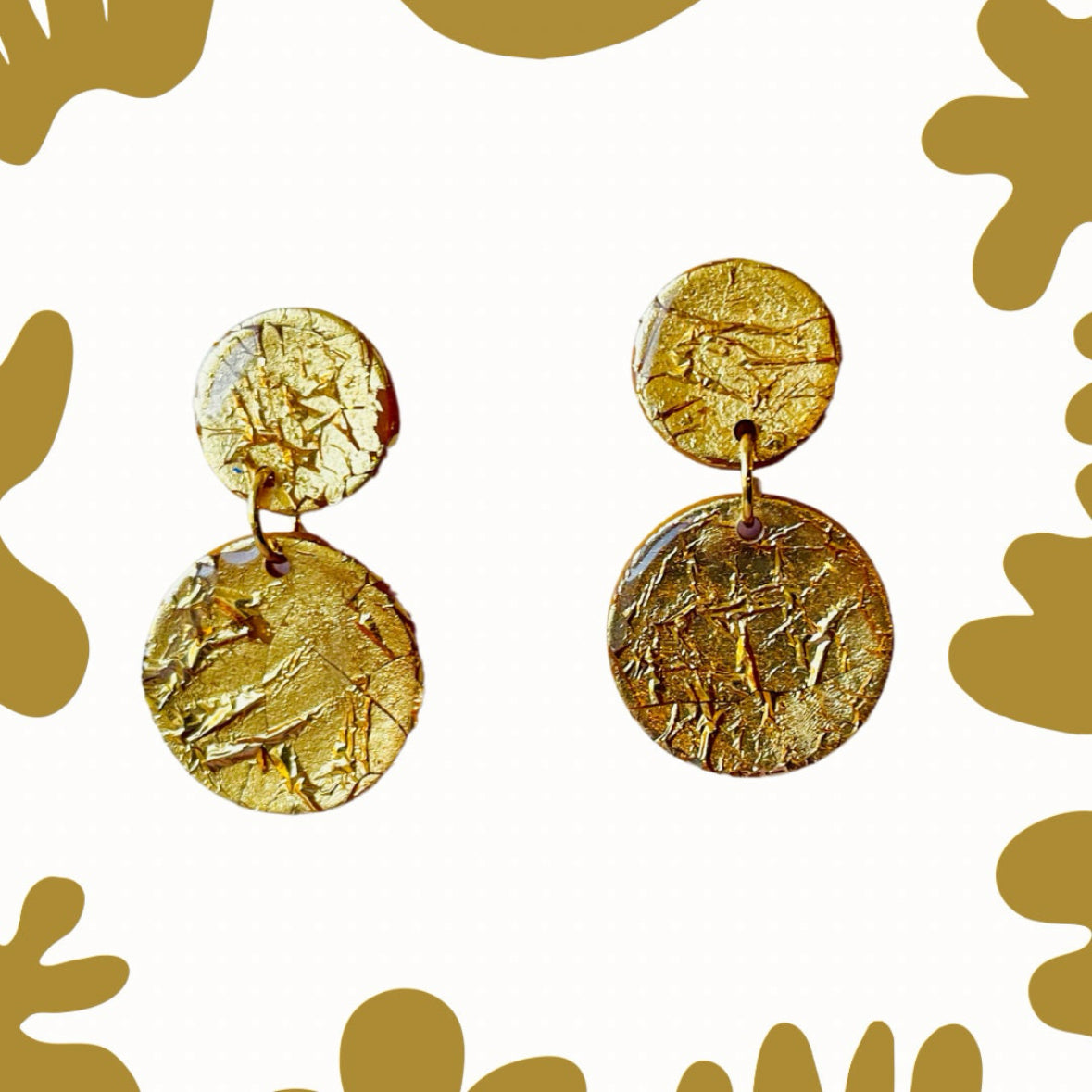 These gold earrings are perfect to bring a touch of sparkle to your day. Perfect for a small gift they are a versatile accessory to suit any style. Looking for unique gifts? Whether for mum or a good friend these handmade polymer clay Golden earrings would be ideal.

Make a statement with our exquisite, handmade earrings – the perfect blend of fashion and fun! Add them to your cart now and enjoy!

Mysarajewellery gold earrings inspired by murano glass