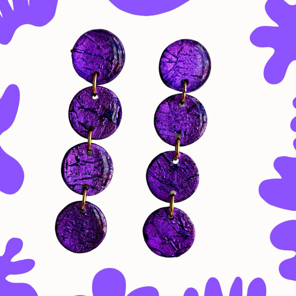These Purple dangle earrings remind me of blueberries and they will certainly add a pop of color to your everyday outfits. These earrings are colorful but the simple design makes them easy to match whether you choose a minimal look or a summery floral dress.

Make a statement or choose a great handmade gift.

mysarajewellery purple Bolle earrings, handmade polymer clay puple earrings