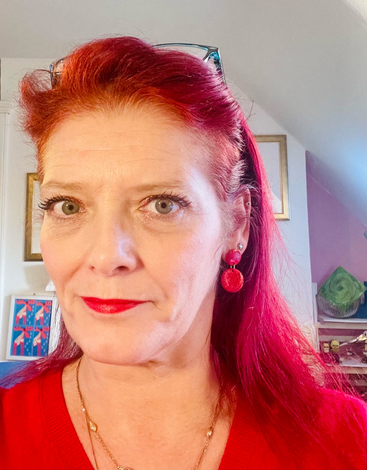 Dazzle with these funky red earrings that look like cracked glass! Crafted from lightweight polymer clay and coated in resin, they're perfect for making a bold fashion statement. Inspired by Murano glass beads, but way easier on the ears. ;)