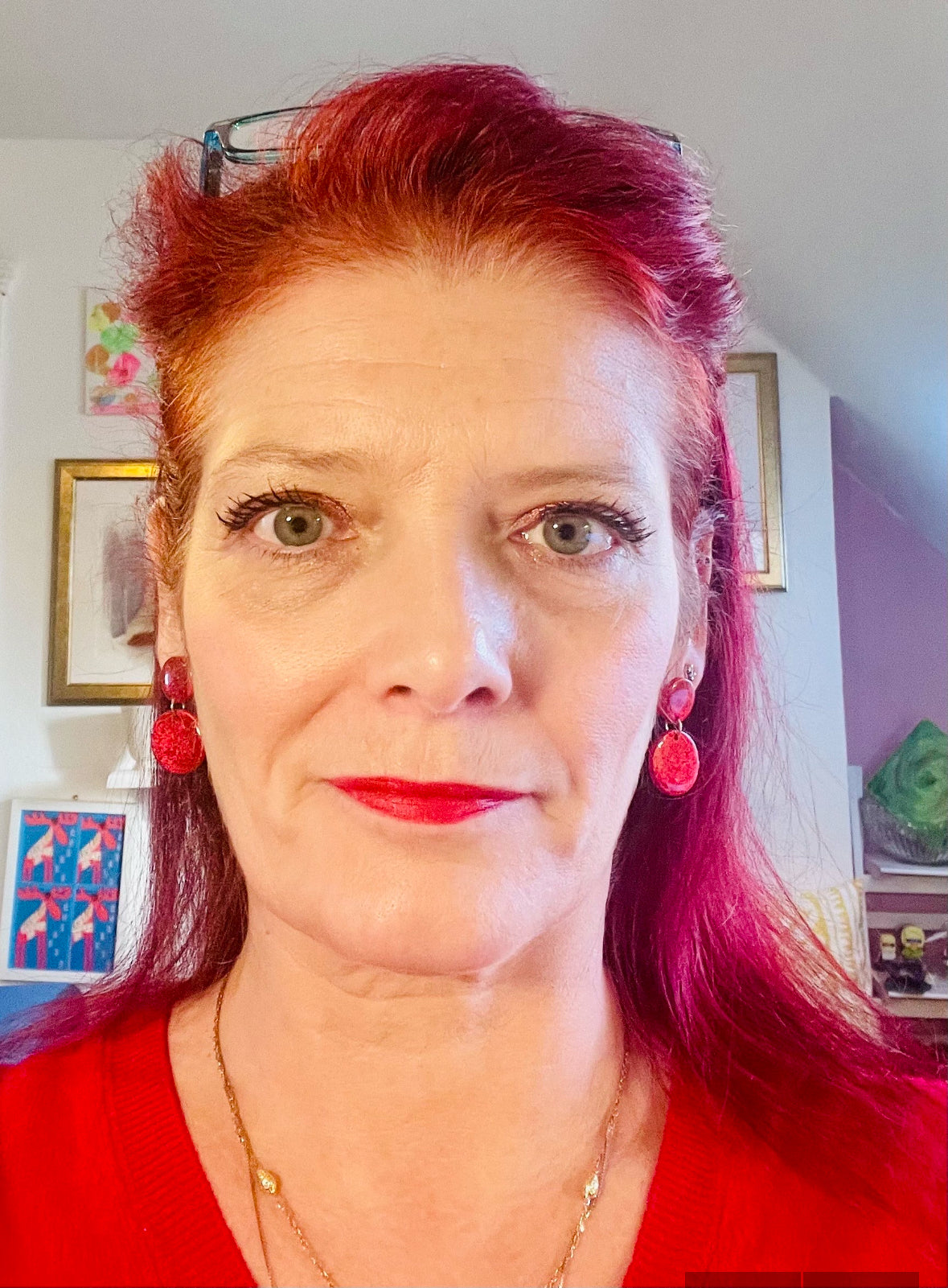 Dazzle with these funky red earrings that look like cracked glass! Crafted from lightweight polymer clay and coated in resin, they're perfect for making a bold fashion statement. Inspired by Murano glass beads, but way easier on the ears. ;)