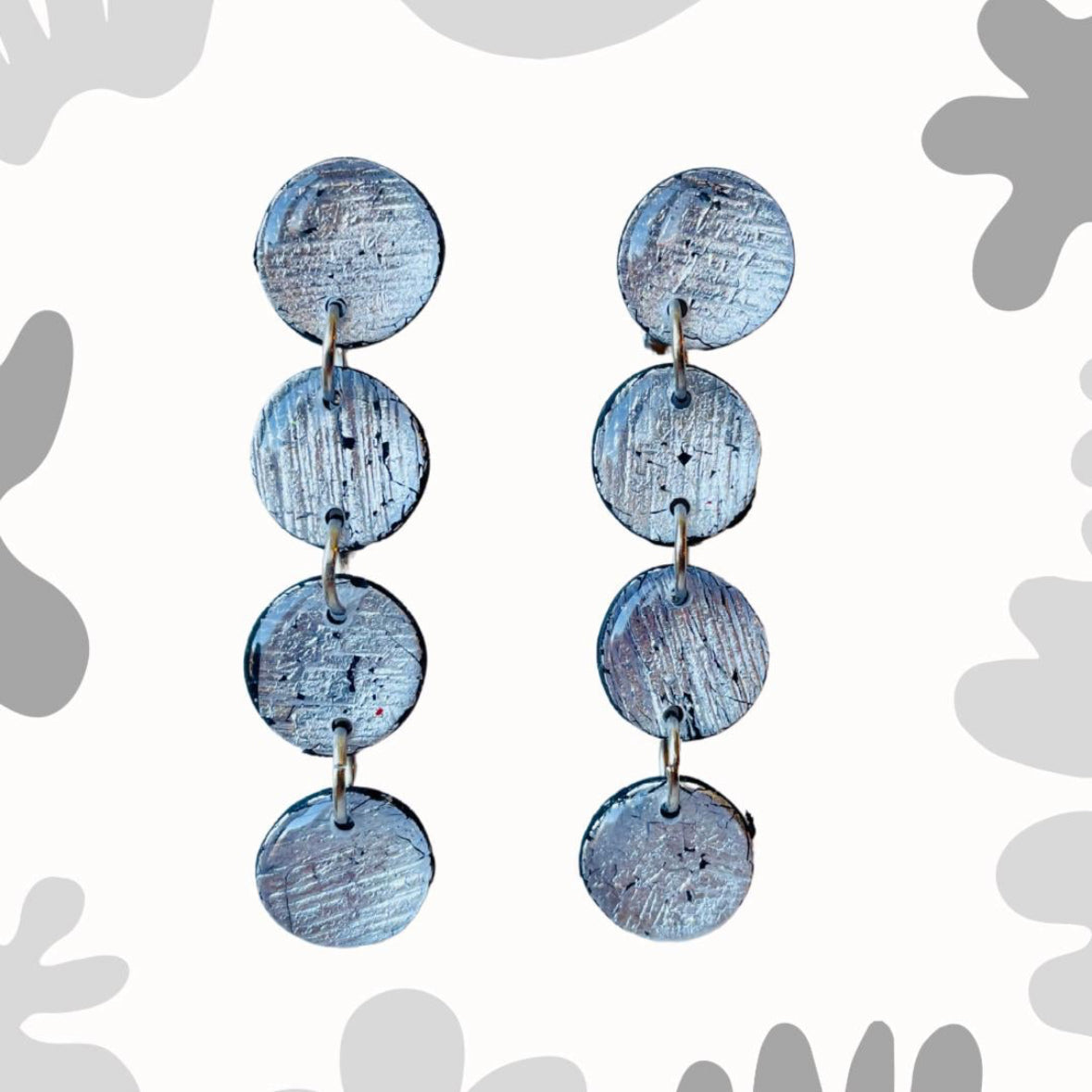 These Silver dangle earrings remind me of bubbles and they will certainly add a pop of shining light to your everyday outfits. These earrings' simple design makes them easy to match whether you choose a minimal look or an evening dress.

Make a statement or choose a great handmade gift.

mysarajewellery silver Bolle earrings, handmade polymer clay silver earrings