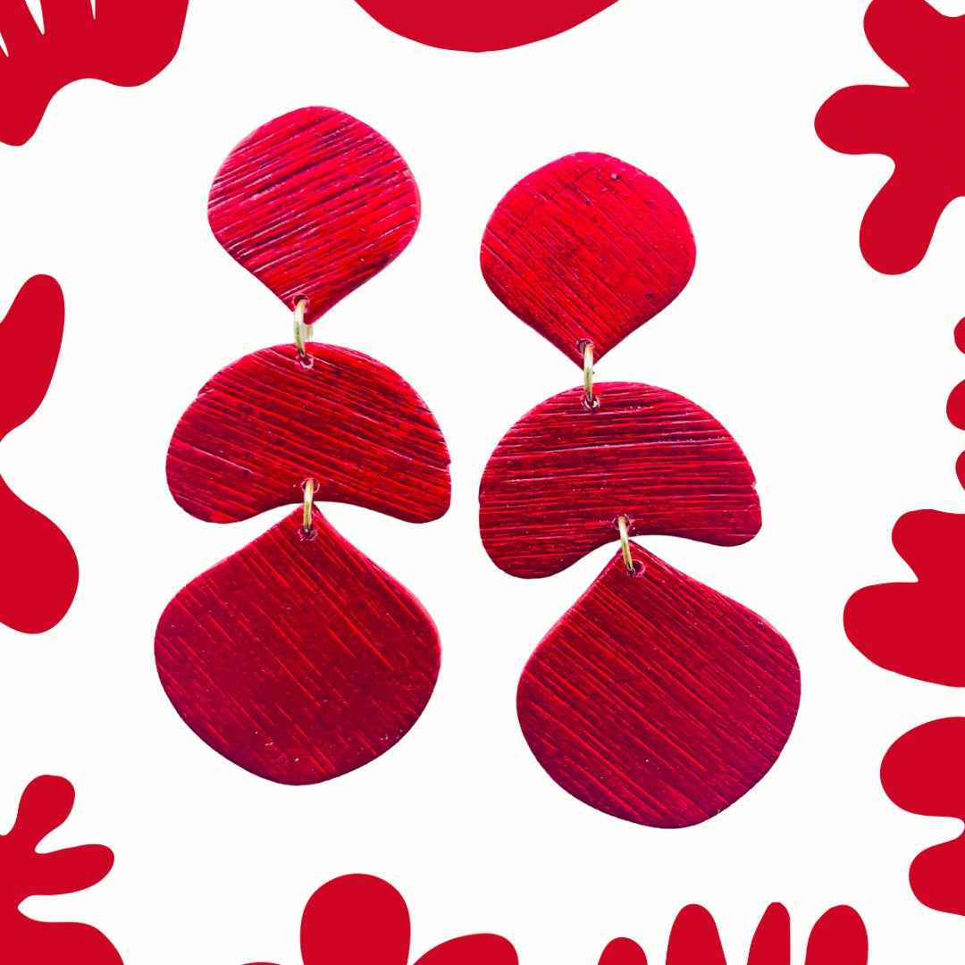 Long red earrings are always glamorous and the perfect accessory for every outfit whether for a special event or everyday wear. These handmade and unique design would make for a unique gift for a special friend or a special occasion.&nbsp; Perfect red for Aries gift. Modern design for elegant look&nbsp;
