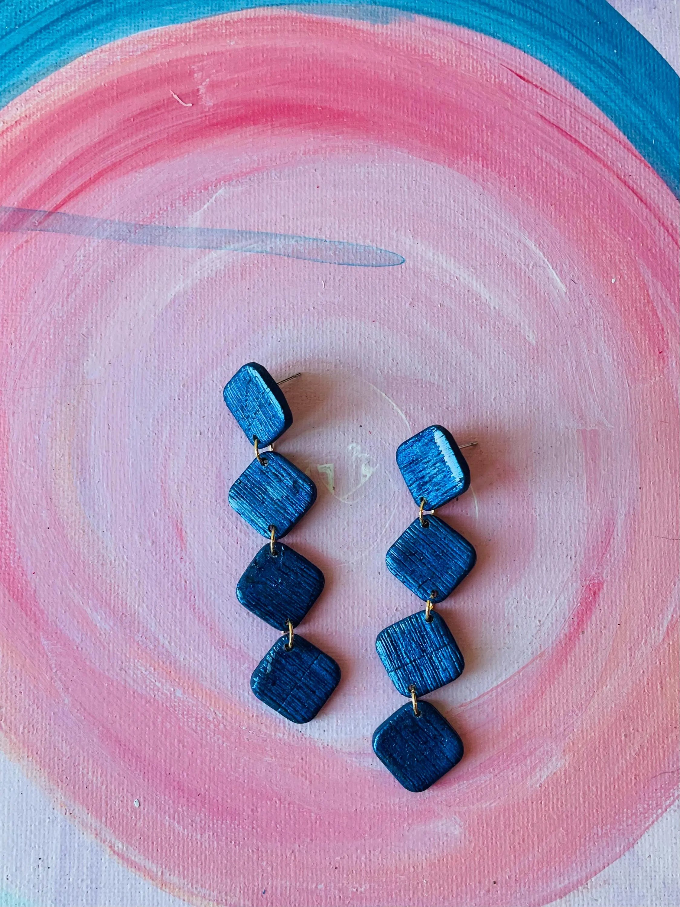 Unleash your inner fashionista with QUADRO - Blue geometric earrings! Elevate your style game at parties or in your everyday life. These one-of-a-kind earrings make for a unique and playful gift option too.&nbsp;

Made of polymer clay these earrings are very comfortable and as stylish or everyday as you want to style them. A beautiful royal navy blue is always easy to match and it's always appropriate.
My Sara Jewellery