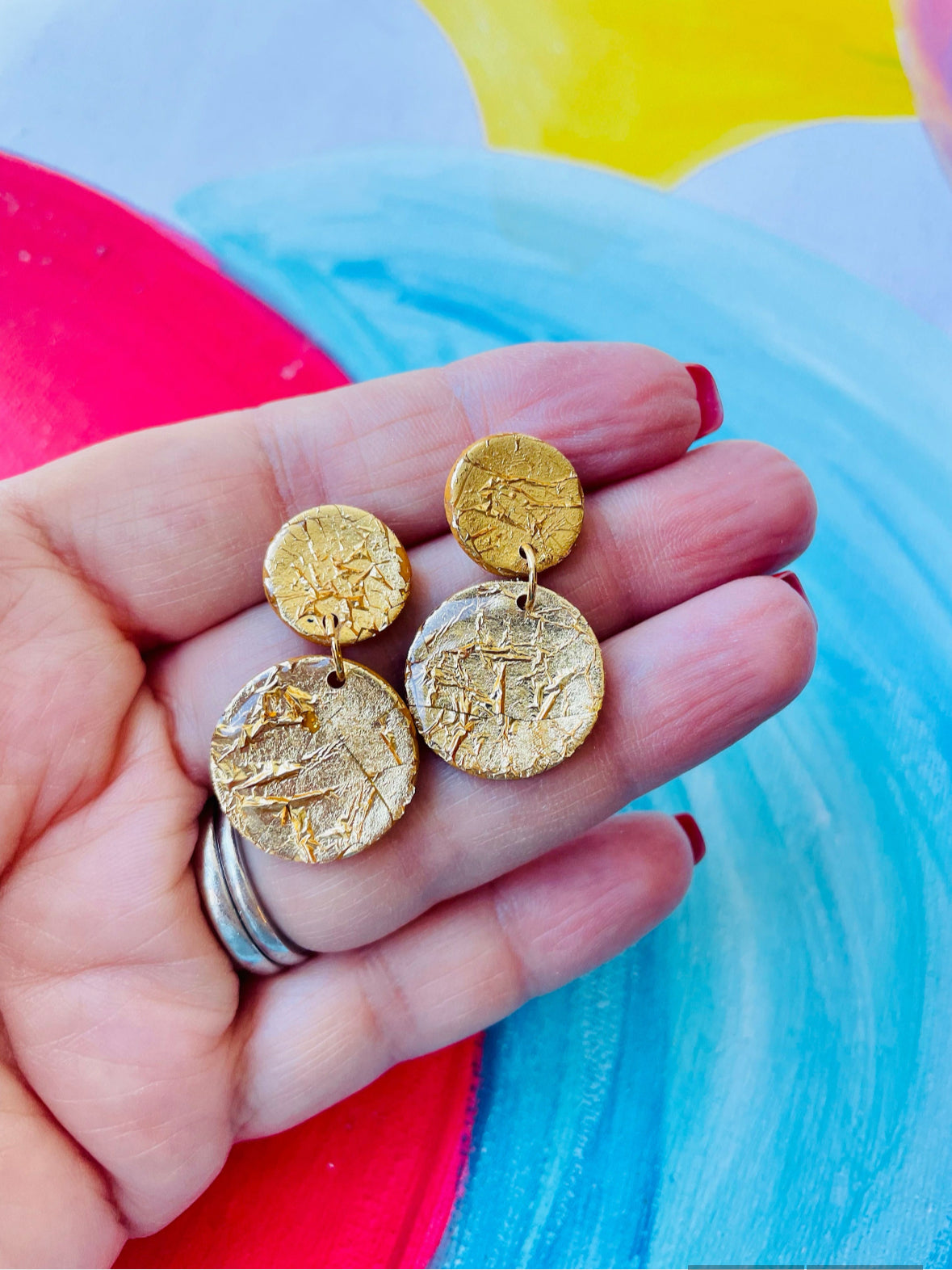 These gold earrings are perfect to bring a touch of sparkle to your day. Perfect for a small gift they are a versatile accessory to suit any style. Looking for unique gifts? Whether for mum or a good friend these handmade polymer clay Golden earrings would be ideal.

Make a statement with our exquisite, handmade earrings – the perfect blend of fashion and fun! Add them to your cart now and enjoy!

Mysarajewellery gold earrings inspired by murano glass
